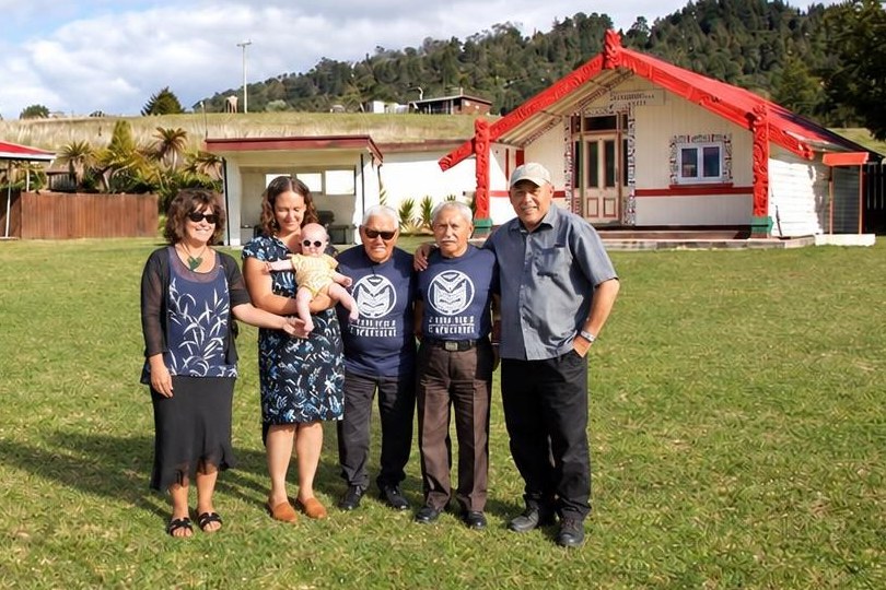 Whānau in front of Te Ao Marama at Roimata Marae